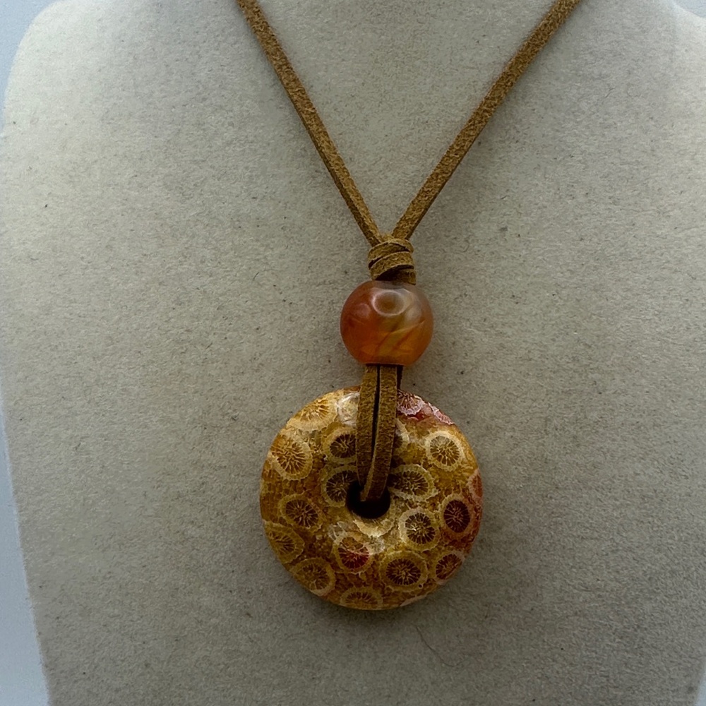 Brown and Tan Coral Fossil Donut Pendant Necklace on Brown Faux Suede - Picture 2 of 13